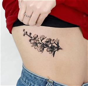 Stunning Floral Rib Tattoos: an Exquisite Art Form